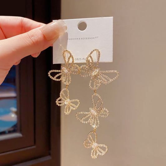 أقراط فراشة غير متماثلة - أقراط أنيقة طويلة مرصعة بالزركون بالكامل 